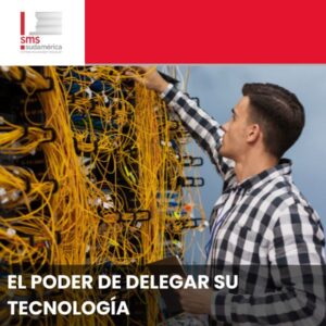 Técnico gestionando un complejo rack de servidores, ilustrando el concepto de delegación de tecnología empresarial